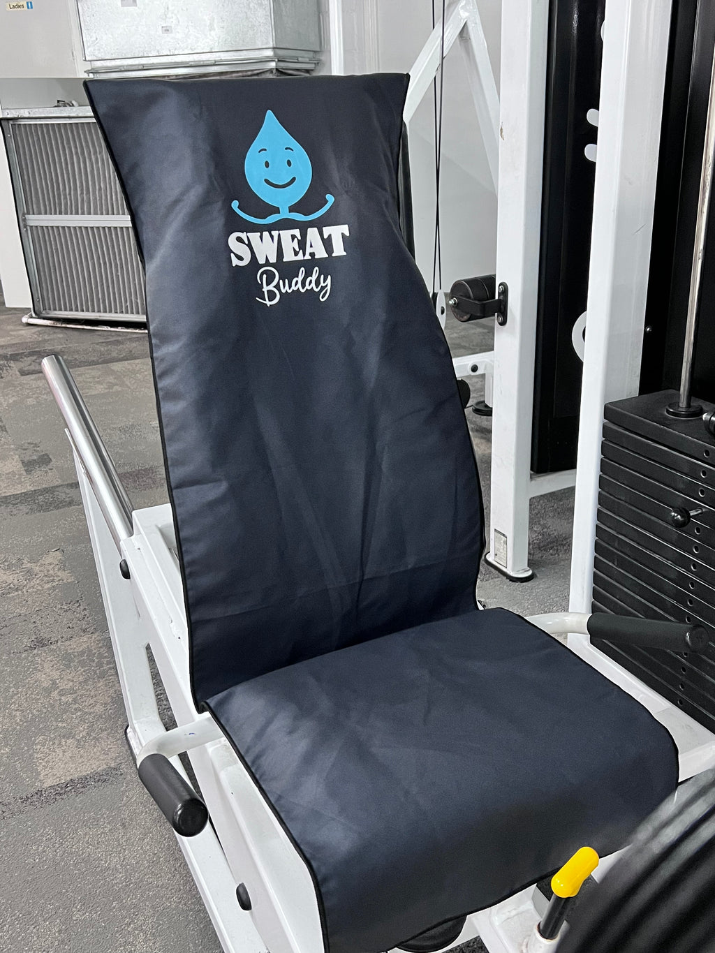 Hooded gym towel with zipped phone / key pocket